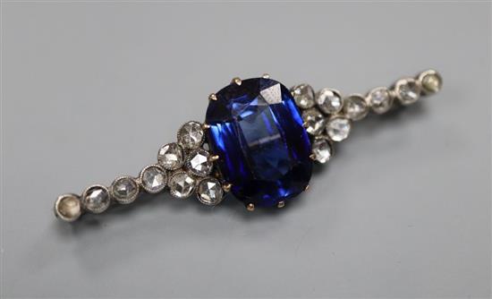 A late Victorian yellow and white metal, synthetic sapphire and rose cut diamond cluster set bar brooch, 48mm, gross 6.6 grams.